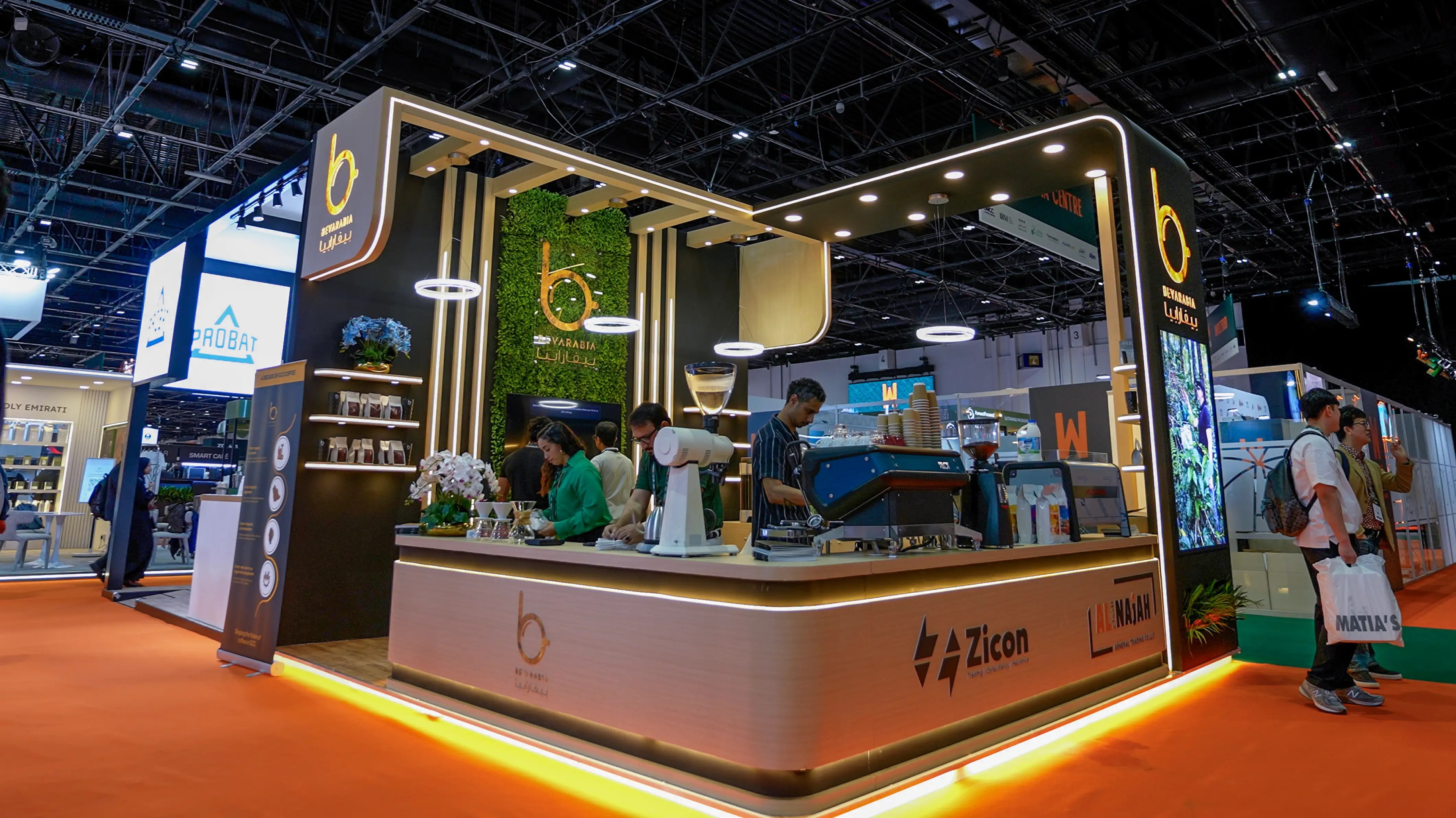 Illuminated luxury exhibition stand with halo lighting and live coffee bar